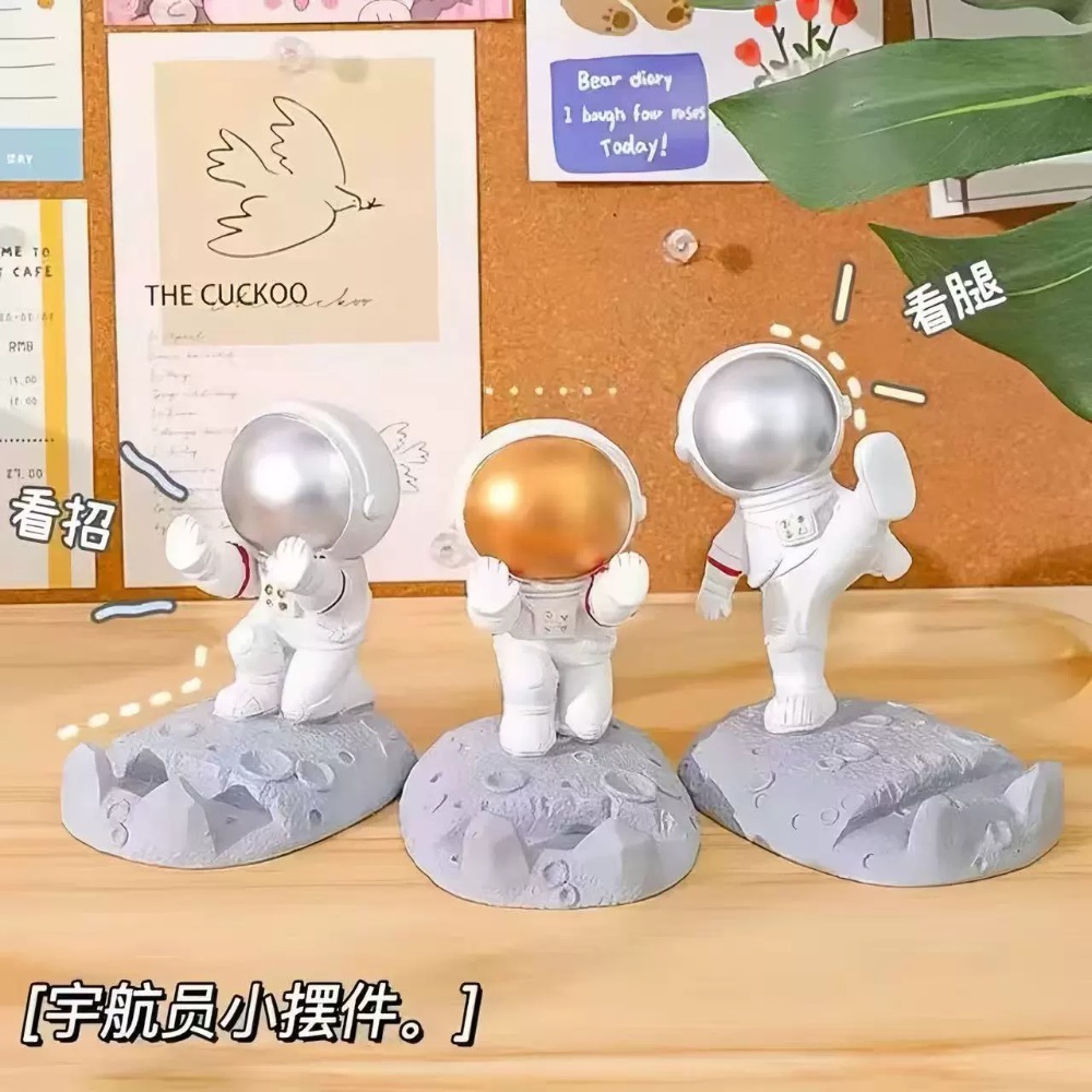 ユニークな宇宙飛行士の電話スタンド宇宙飛行士アクションフィギ - Crafting Resin のレビューと価格